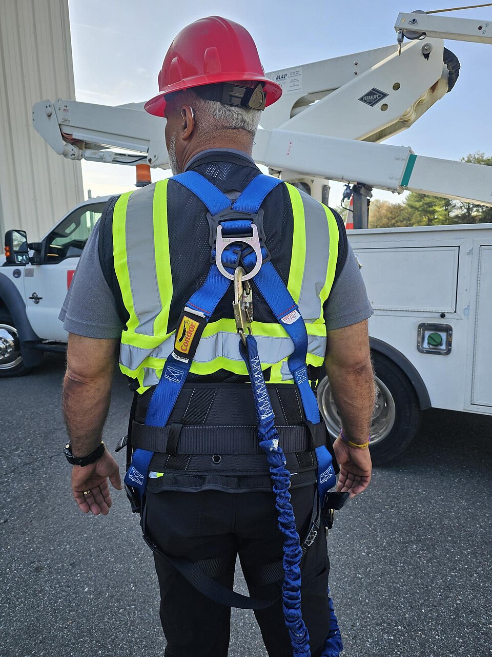 Illustrative photograph of a worker wearing a safety harness